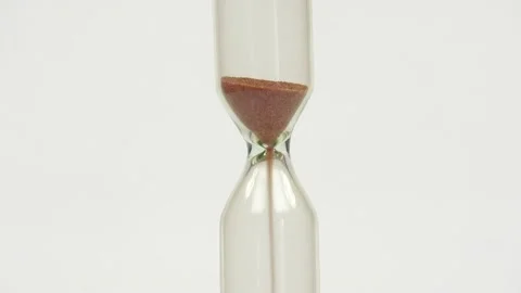 Sandglass isolated on white background. Time is running. Hourglass with falling Stock Footage 201383722
