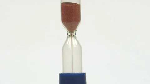 Sandglass isolated on white background. Time is running. Hourglass with falling Stock Footage 201383733