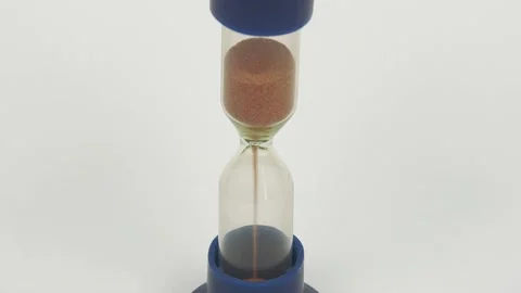 Sandglass isolated on white background. Time is running. Hourglass with falling Stock Footage 201383753