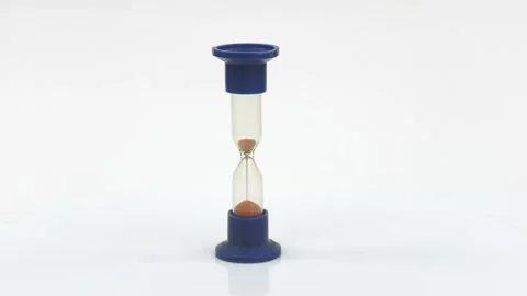 Sandglass isolated on white background. Time is running. Hourglass with falling Stock Footage 201383920