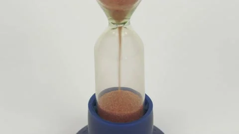 Sandglass isolated on white background. Time is running. Hourglass with falling Stock Footage 201384019