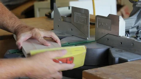 Sanding Board after Cut on Compound Miter Saw Stock Footage 108278041