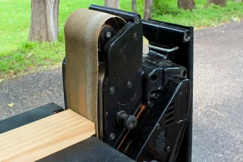 Sanding a board 스톡 사진