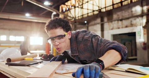 Sanding, carpenter and dust with plank in warehouse for project, planning and Stock Footage 340623869