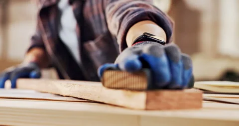 Sanding, carpenter and hands with plank in workshop for project, planning and Stock Footage 340614553