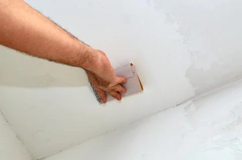 Sanding a ceiling Stock Photos