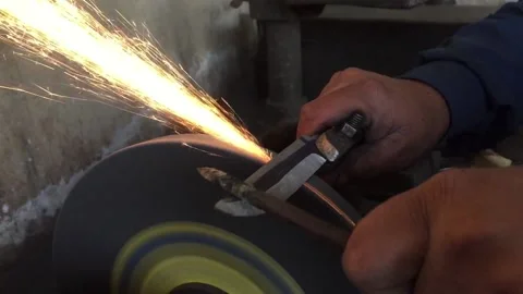 Sanding knife on a sand wheel Stock Footage 150716607