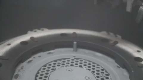 Sanding old metal engine part in a gritter. Stock Footage 111720768