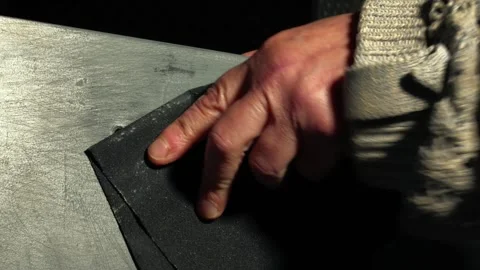 Sanding surface with sandpaper close up Stock Footage 255999322