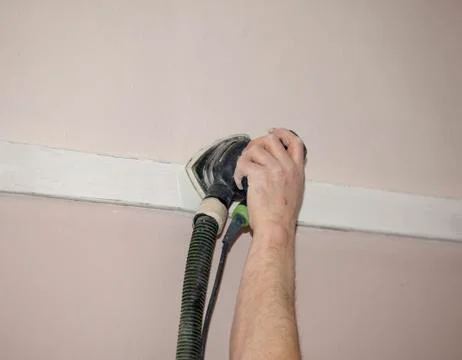 Sanding wood with machine Stock Photos