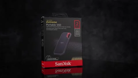 SanDisk Extreme Portable SSD 2TB on black background - FRANKFURT, GERMANY APRIL Stock Footage 310067475
