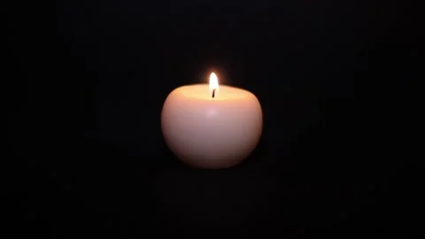 Сandle burns on a black background. Stock Footage 122370965