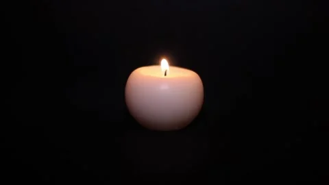 Сandle burns on a black background. 動画素材 122370970