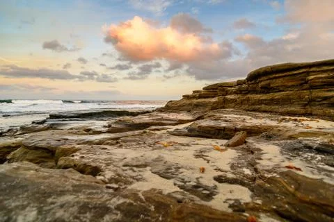 Sandstone and clouds Stock Photos