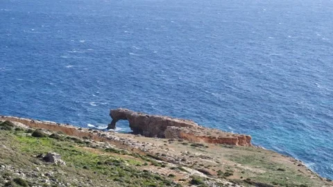Sandstone Arch in Front of the Sea Stock Footage 265503775