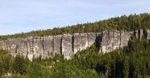 Sandstone cliffs above forest in Teplicke skaly, Czech Republic Stock Photos