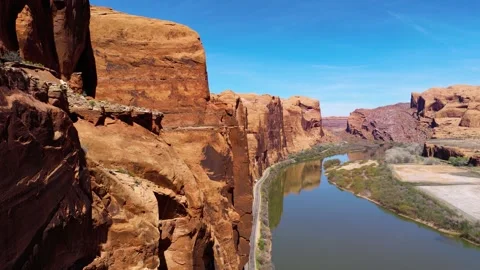 Sandstone cliffs along the Colorado River on the La Sal Mountain Loop in Moab Stock Footage 333202348