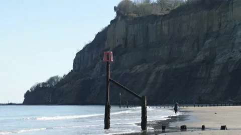 Sandstone cliffs of Luccombe, Beach groynes in foreground, IOW, UK Stock Footage 238726594
