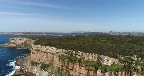 Sandstone cliffs of North Head at Sydney Harbour – aerial view to CBD, 4k. Stock Footage 158262356