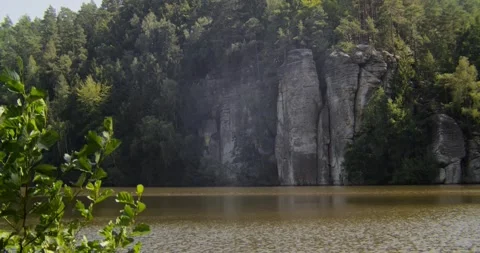 Sandstone Rock Formations Over Lake In Bohemian Paradise Czech Republic 스톡 동영상 345080224