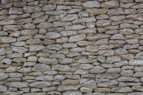 Sandstone wall - background texture. Stock Photos