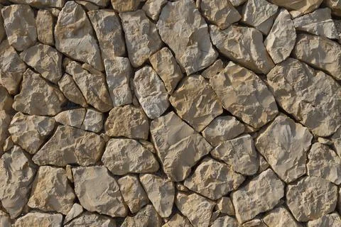 Sandstone wall texture. Stock Photos