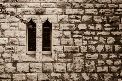 Sandstone wall with two small windows, Sandstein Stock Photos