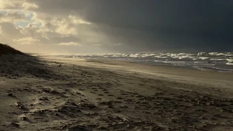 Sandstorm and dark clouds on Baltic sea in winter Stock Footage 167273991