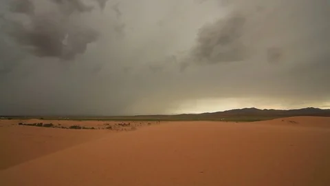 Sandstorm in the desert during a thunderstorm Stock Footage 78497095