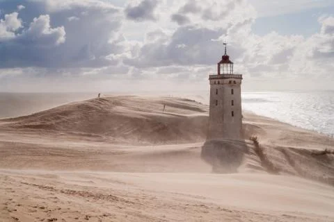 Sandstorm at the lighthouse Stock Photos