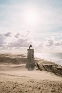 Sandstorm at the lighthouse Stock Photos
