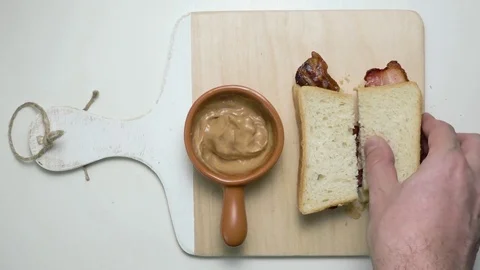 Sandwich with bacon and sauce, time-lapse Stock Footage 74237472