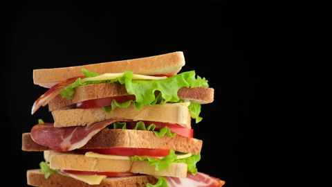 Sandwich on black background rotating 動画素材 147525702