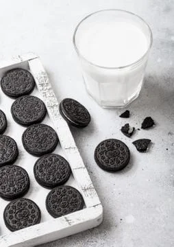 Sandwich black cookie consisting of two chocolate wafers with cream filling Stock Photos
