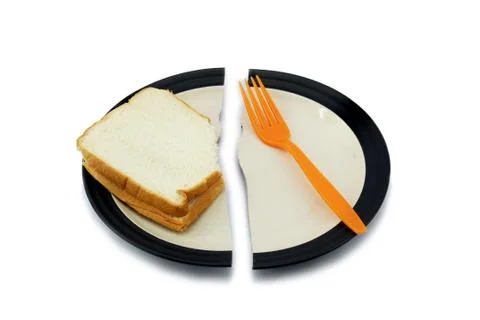 Sandwich bread and a fork on a broken plate for diet concept. Stock Photos