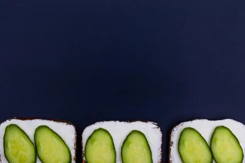 Sandwich with cucumber on slice of bread. 스톡 사진