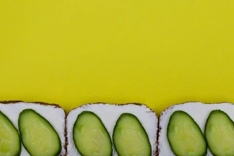 Sandwich with cucumber on slice of bread. 스톡 사진