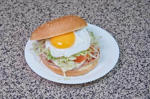 A sandwich with an egg on top of it Stock Photos