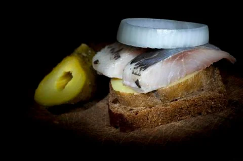Sandwich with herring Stock Photos