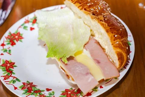 Sandwich with open bread with cheese ham lettuce and mayonnaise on a plate .. Stock Photos