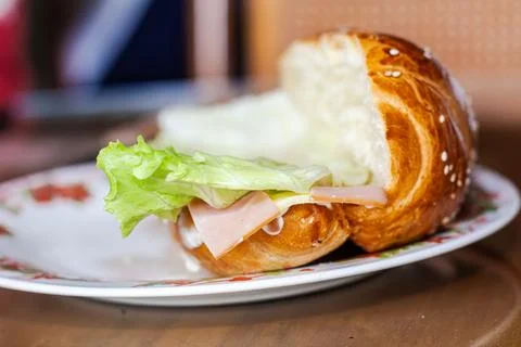 Sandwich with open bread with cheese ham lettuce and mayonnaise on a plate .. Stock Photos