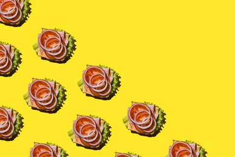 Sandwich pattern on the yellow background Stock Photos