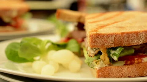 Sandwich on plate - refocused Stock Footage