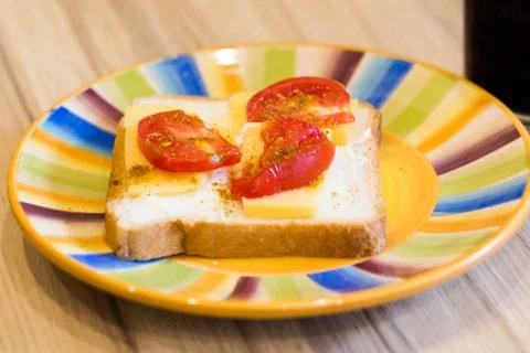 The sandwich on the plate on the table3 Stock Photos