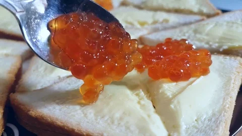 Sandwich with red caviar Video stock 83957928