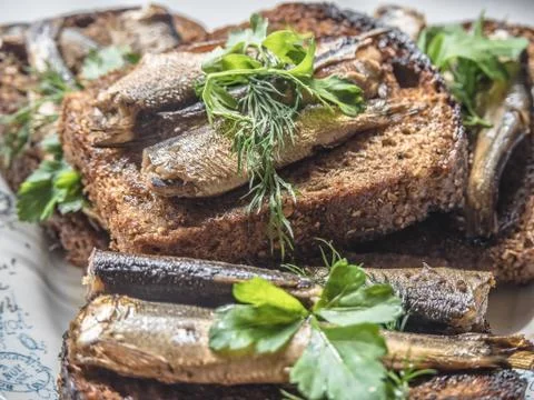 Sandwich sprats on bread Stock Photos