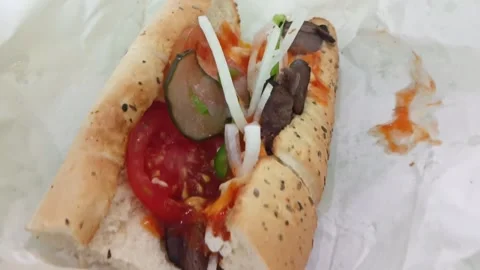 Sandwich on tissue. slow motion camera movement. Stock Footage 297664132