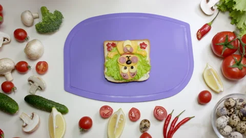 Sandwich with vegetables and cheese on violet cutting board Stock Footage 232203220