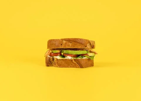Sandwich on yellow background. Stock Photos