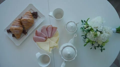 Sandwiches and tea on the table Stock Footage 348010181